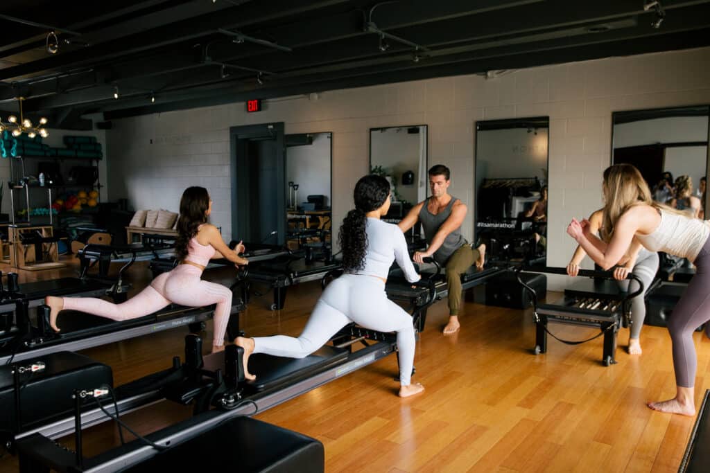Group reformer Pilates class at Marathon Pilates in Nashville
